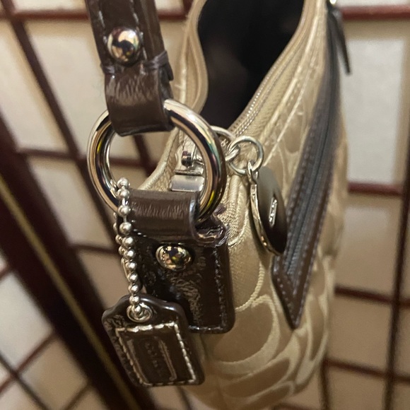 Coach tan and brown monogram sling bag. Interior is a bit dirty. - Picture 3 of 8